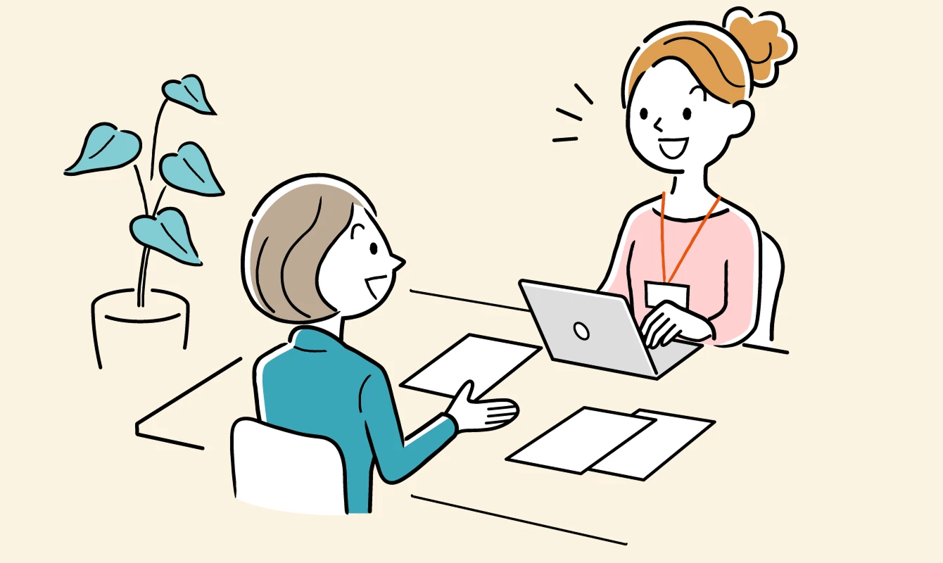 転職エージェントの担当者と面談する女性